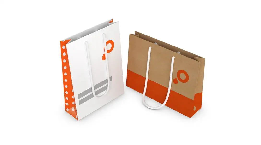 Papiertragetaschen mit Stoffkordel schulterlang Artikel Papiertragetaschen mit Stoffkordel schulterlang